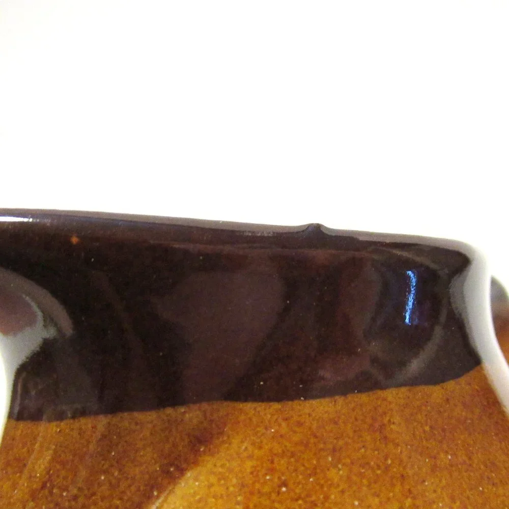Brown and White Ceramic Serveware Pitcher